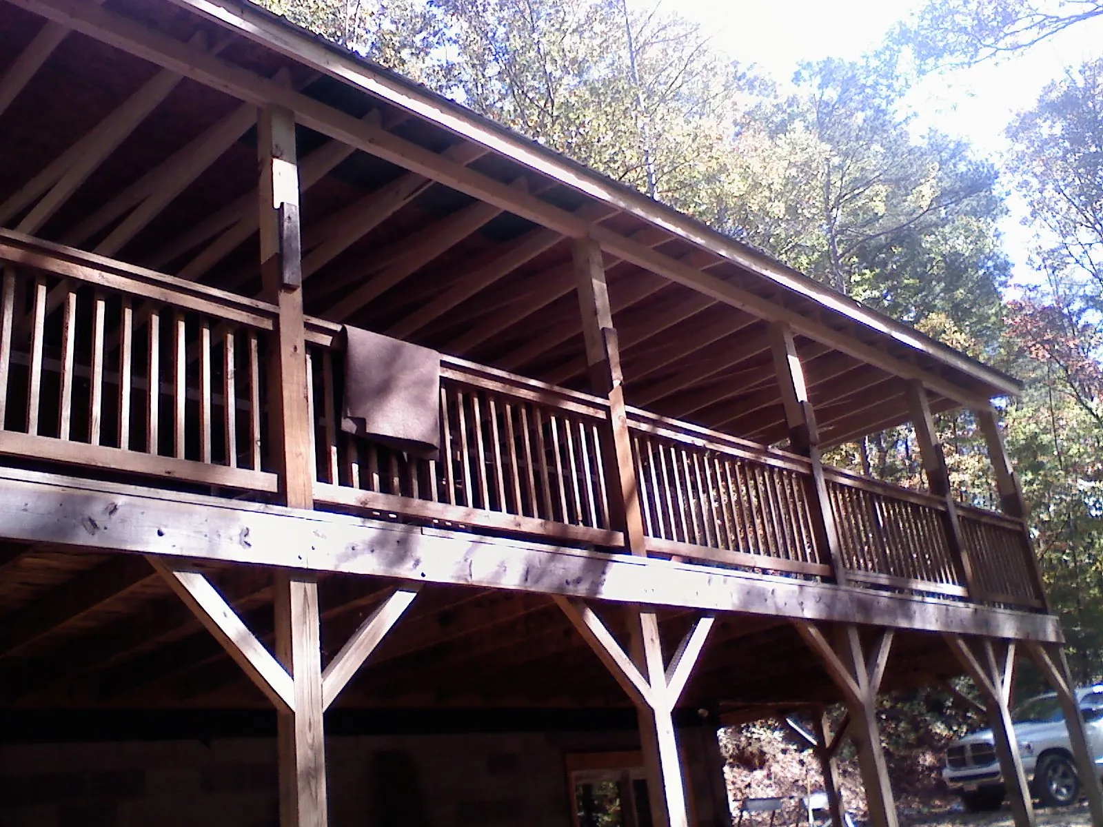 Timber framing under a new elevated porch and deck — Roof Leak Repair in Eau Claire by Roofing Brothers